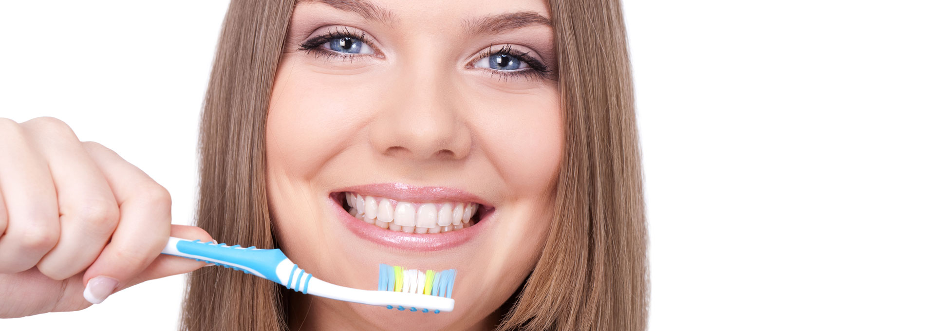 Smiling woman with great teeth holding tooth-brush